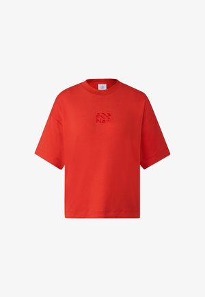 Red cotton T-shirt with a round neckline and short sleeves. Features textured "BOGNER" logo in the center. Casual boxy design.