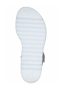 White rubber shoe sole with horizontal ridges, rounded toe, and embossed logo. Textured for grip and comfort.
