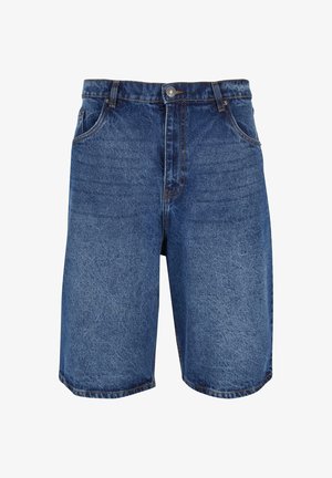 Jeanshorts i mellomblå farge, med klassisk design, fem lommer og glidelås med knappelukking. Grovt tekstur og rett snitt.