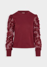 Burgundy sweatshirt with long sheer sleeves featuring ruffle details, round neckline, and fitted cuffs. Soft fabric with textured accents.