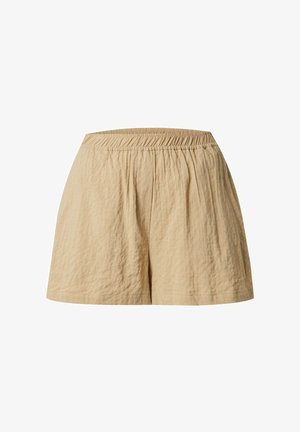 Beige Baumwollshorts mit elastischem Bund, strukturiertem Stoff und lockerer Passform, die ein einfaches Design ohne Taschen oder Verzierungen aufweisen.