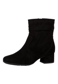 Botas de tobillo de ante negro con punta redondeada, parte superior holgada y un tacón bajo cuadrado. Presenta costuras de contraste y una textura suave.