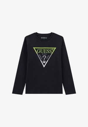 Čierne tričko s dlhým rukávom vyrobené z bavlny, s trojuholíkovým logom v zelenej, sivej a bielej farbe a textom "GUESS U.S.A." a otáznikom.
