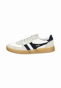 Sneakers met een crème bovenkant, zwarte suède accenten en mesh panelen. Bevat een gestructureerde rubberen zool en gestreepte details aan de zijkanten.