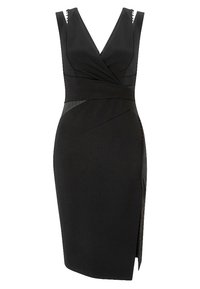 Robe noire sans manches longueur genou avec col en V, détail à la taille effet portefeuille, fente latérale et boutons décoratifs le long du côté droit.