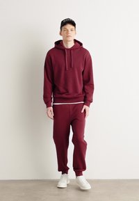 HUGO TRACKSUIT DAPODAYOTE SET - Treniņtērps - dark pink