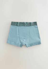 Bóxers azul claro para niños con una cintura ancha de color gris oscuro con la palabra "NEXT" en letras grandes.