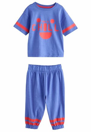 Blue cotton short-sleeve shirt with "TIME TO CHILL" text, paired with blue elastic waist pants featuring red striped accents at the cuffs.