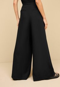 Next SUPERWIDE TALL  - Pantaloni - black