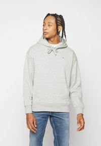 Tommy Jeans BASKETBALL HOODIE - Bluză de molton - silver grey