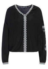 Blusa nera con maniche lunghe, scollatura a V e ornamento ricamato bianco che presenta motivi geometrici lungo la parte anteriore e le maniche.