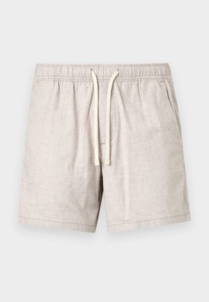 Beige linnenshorts med elastisk midje och snörning. Har sidofickor och en avslappnad passform. Slät textur och enkel design.
