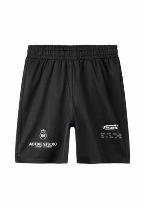 Shorts de sport noirs avec ceinture élastique, présentant des logos texte blancs "Active Studio Zero Limits 86" et "Athletic" avec des phrases motivantes.