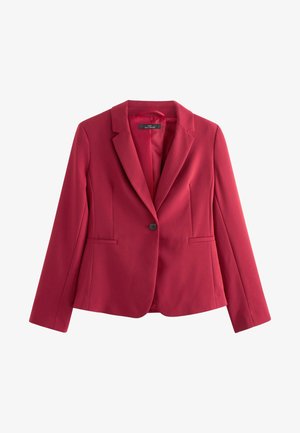 Blazer rosso sartoriale realizzato in tessuto liscio, con un solo bottone, revers a lancia e due tasche frontali. Vestibilità classica e strutturata.