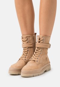 s.Oliver Lace-up ankle boots - camel