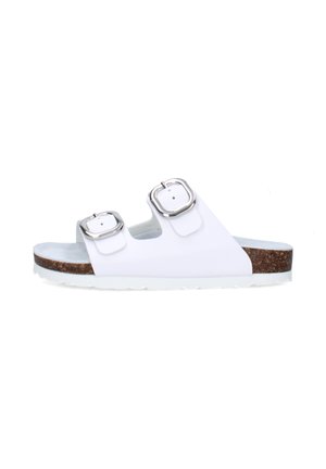Sandalo bianco tipo slide con due fibbie argento regolabili e suola con texture effetto sughero su sfondo bianco.