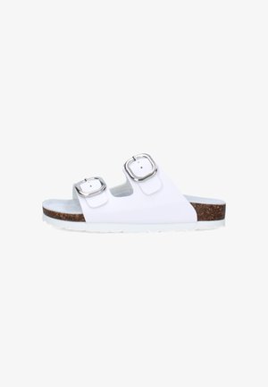 Sandalo bianco tipo slide con due fibbie argento regolabili e suola con texture effetto sughero su sfondo bianco.