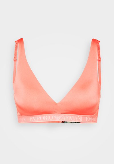 Bralet coral cu un design în formă de V, textură netedă și bandă cu logo. Bretelele sunt ajustabile, având un stil minimalist și fără armătură.