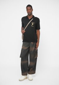 Armani Exchange UNISEX - Polosärk - black