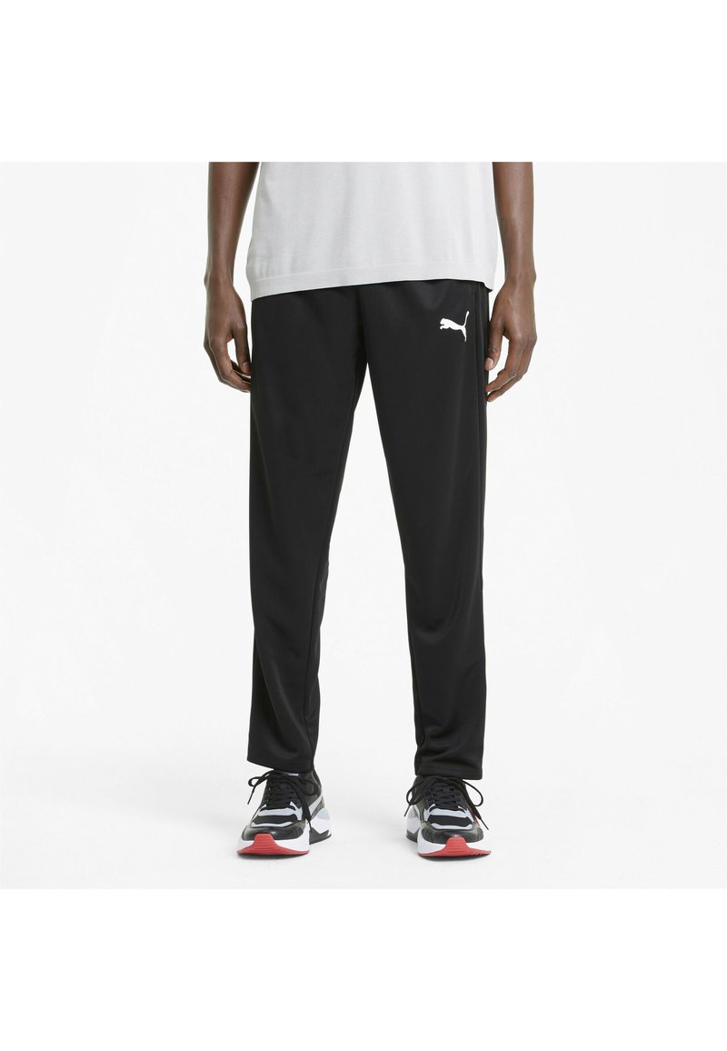 Puma Tracksuit bottoms - black - Zalando.co.uk