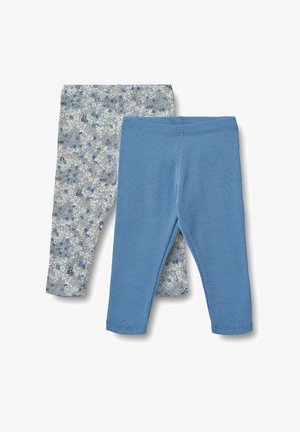 Două perechi de colanți: una cu un model floral albastru pe un fundal deschis, cealaltă albastră solid. Ambele sunt realizate dintr-un material moale și elastic.