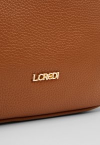 L.CREDI EDA - Cross body bag - cognac