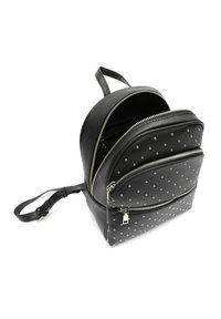 Black leather backpack with two zippered compartments, featuring small metallic studs across the front panel and a top carry handle.