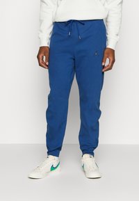 Jordan WARMUP PANT - Calças de fato de treino - french blue
