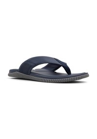 Marineblaue Flip-Flop-Sandalen mit einem strukturierten Riemen, gepolsterged Sohle und flexibler grauer Gummiaußensohle. Der Riemen hat ein Zickzackmuster.