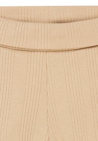 Rippenstoff in Beige, der Details des Bunds mit subtiler Textur zeigt. Das Material wirkt weich und dehnbar, geeignet für ein angenehmes Tragegefühl.