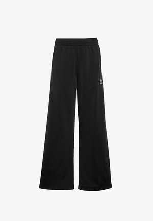 Pantalons larges noirs en tissu doux, dotés d'une taille élastique et d'un petit logo blanc sur le côté gauche.