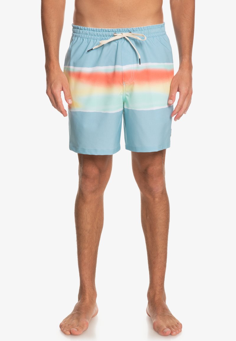 Modré plavky s horizontálnymi gradientovými pruhmi v oranžovej, ružovej a zelenej farbe. Elastický pás so šnúrkou, ľahký materiál.