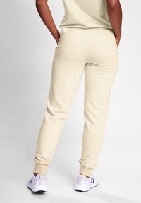 Hummel PAOLA  - Jogginghose - vanilla ice