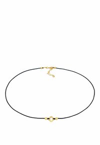 Black cord necklace featuring a central gold-tone metal accent with an intricate design, secured with a gold-tone clasp and extension chain.