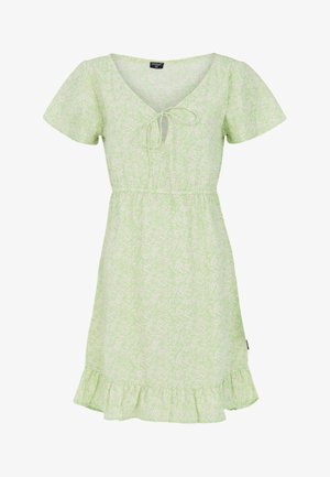 Laganozelena haljina s kratkim rukavima, V izrezom, strukom s vezicom, cvjetnim uzorkom i volanom na rubu. Izrađena od mekog materijala, pogodna za svakodnevno nošenje.