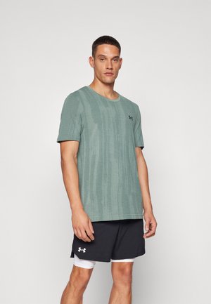 VANISH SEAMLESS NOVELTY  - Print T-shirt - silica green/black
