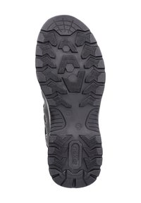 Black rubber sole with deep, textured tread patterns and logo. Features a contoured design for grip and durability.