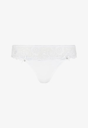 White lace thong with floral embroidery, smooth fabric, scalloped trim, and small bow accent at the side for detailed decoration.