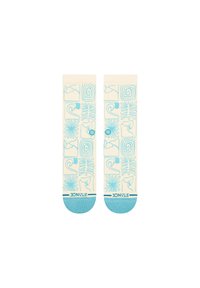 Light beige socks with blue abstract patterns, including swirls and floral motifs. Solid blue accents at the toe and cuff.