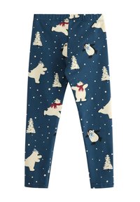 Blå leggings med et festligt mønster, der viser isbjørne, pingviner og sneklædte træer, lavet af strækbart stof.