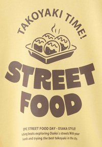 Illustration de boules de takoyaki fumantes dans un plateau avec un texte faisant la promotion de la street food à la façon d’Osaka et de la dégustation de takoyaki.