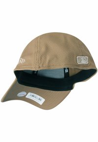 Brown mesh baseball cap with a curved visor, black inner band, and MLB logo patch on the side. Tag with barcode attached inside.