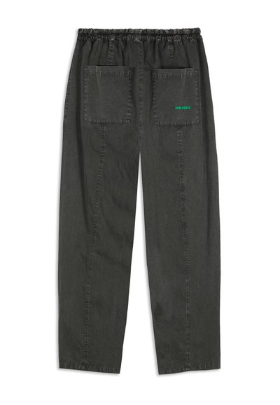 Dark gray trousers with an elastic waistband, two back pockets, and green logo text. Soft, textured fabric with a relaxed fit design.