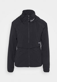Black zippered jacket with a high collar, hood, and a cropped design. Smooth fabric with a reflective logo accent on the shoulder.