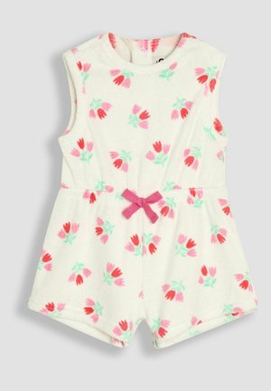 Fehér ujjatlan overál pasztell virágmintával piros és rózsaszín árnyalatokban, rugalmas derekú, rózsaszín masnidíszítéssel. Puha, textúrált anyag.