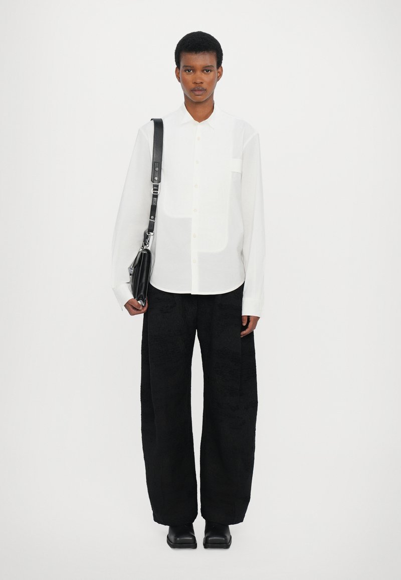 Henrik Vibskov ONE PANTS - Trousers - fishes black