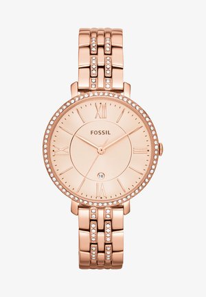 Rose gold Fossil watch with a round face, Roman numeral markers, crystal accents around the bezel, and a linked bracelet strap.