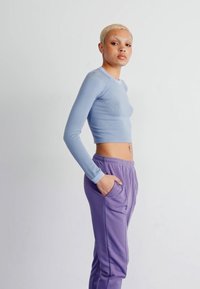 Nike Sportswear Treniņtērpa apakšdaļas - daybreak