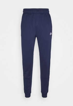 TRIBUTE - Tracksuit bottoms - midnight navy/white