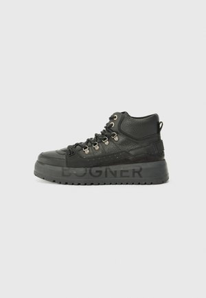 High-top black sneaker featuring a textured leather upper, metal eyelets, and a thick rubber sole with "BOGNER" branding.